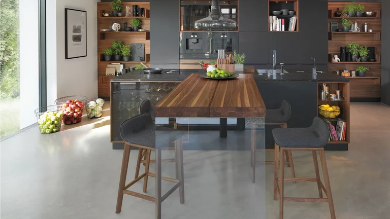 solid wood kitchen with coloured glass fronts, kitchen island with add-on table and bar stools solid wood kitchen black line in walnut with coloured glass fronts, kitchen island with add-on table and ark bar stools