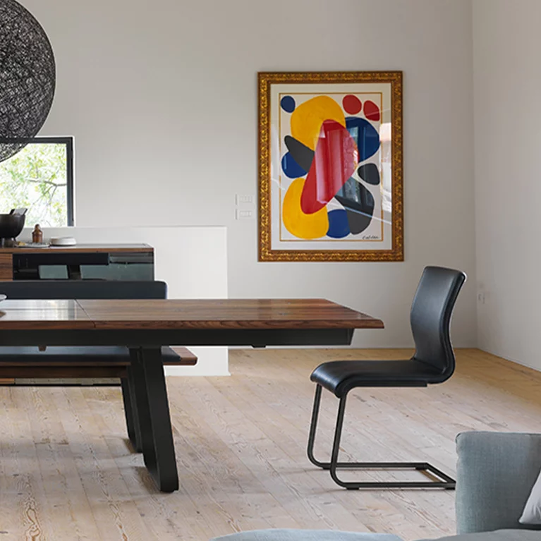 dining table nox solid extendable in walnut upholstered with magnum cantilever chairs