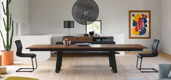 dining table nox solid extendable in walnut upholstered with magnum cantilever chairs