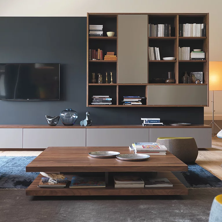square coffee table c3 with storage space in solid walnut in a modern living room