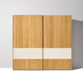 valore sliding door wardrobe in solid oak with coloured glass surfaces
