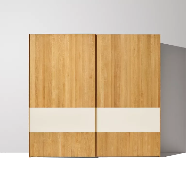 valore sliding door wardrobe in solid oak with coloured glass surfaces