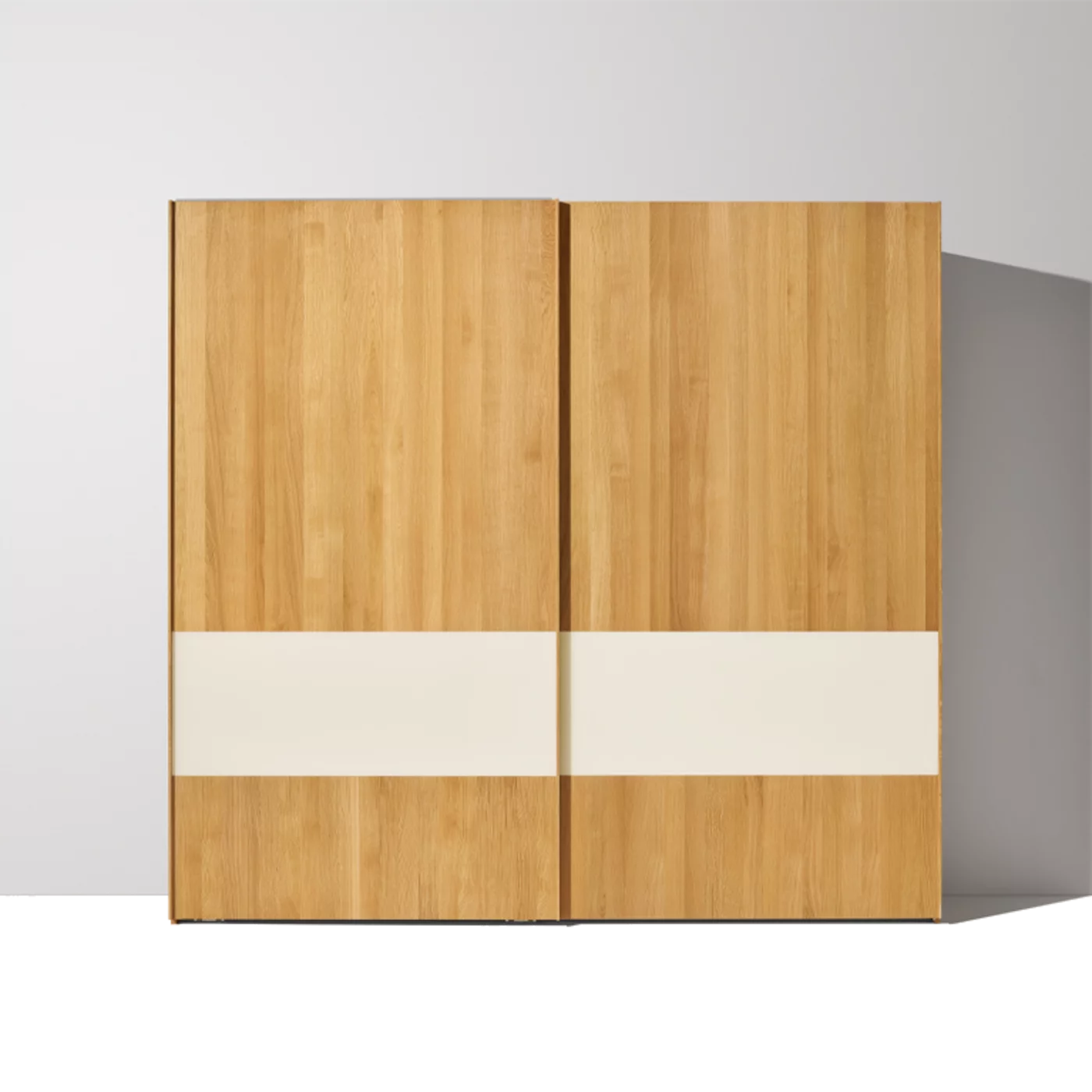 valore sliding door wardrobe in solid oak with coloured glass surfaces