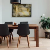 lui dining chairs with leather and wooden base in walnut and magnum dining table in walnut