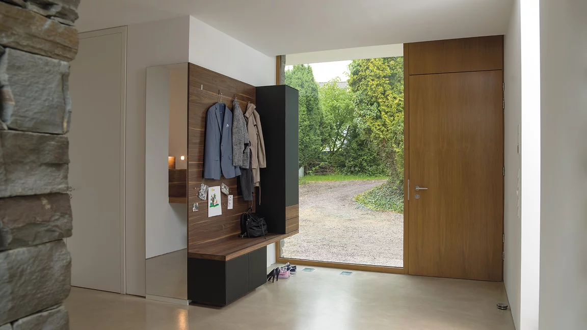elegant cubus pure wardrobe in walnut with coloured glass fronts in black