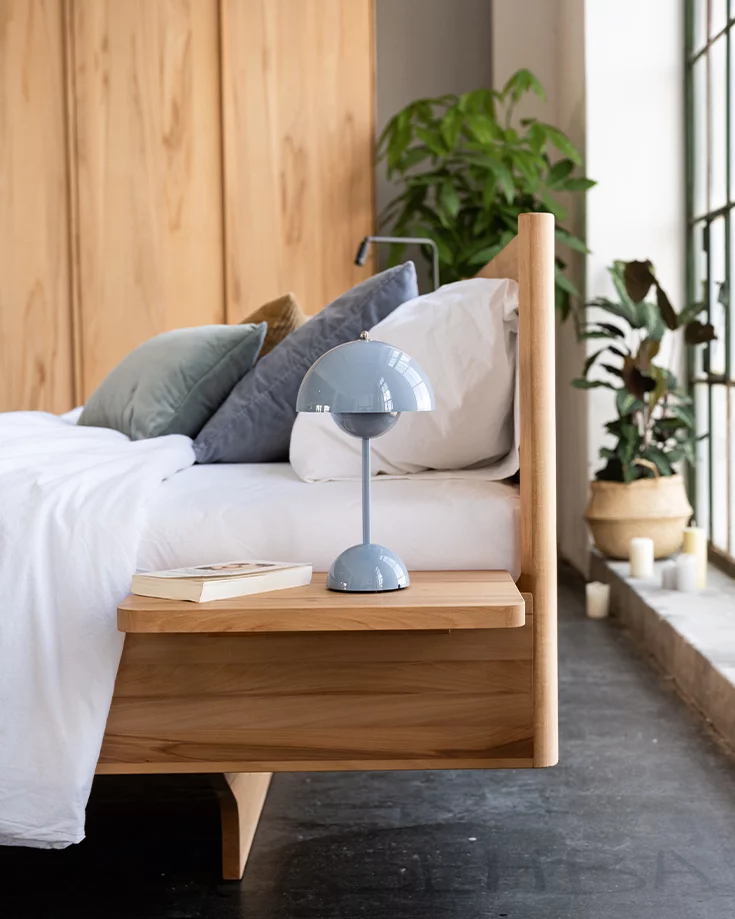 detailed view of the wooden bedside table console from the times bed in solid beech heartwood