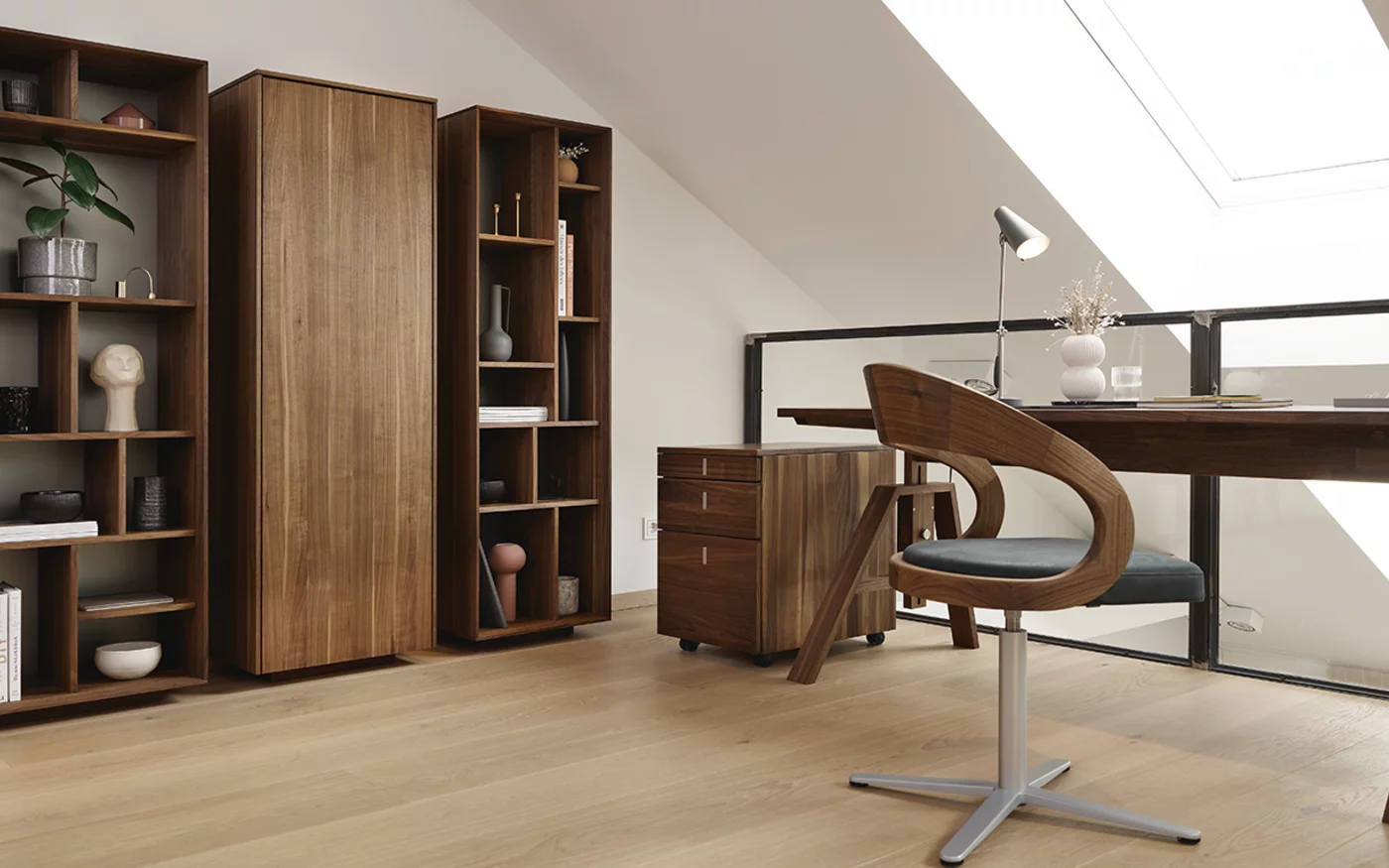 elegant atelier desk with girado chair and cubus container in walnut