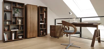 elegant atelier desk with girado chair and cubus container in walnut