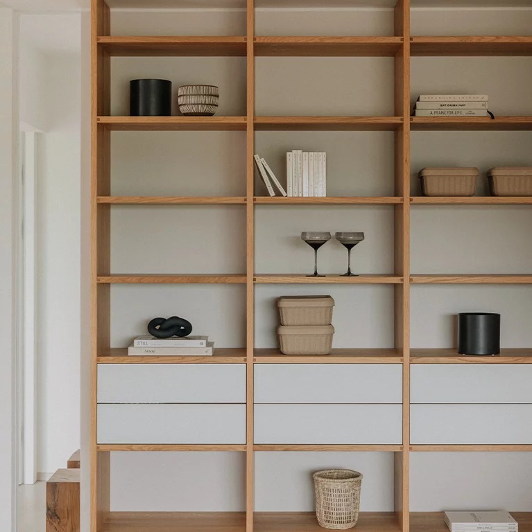 modern cubus shelf in solid oak with glass drawers in matt white and touch fittings
