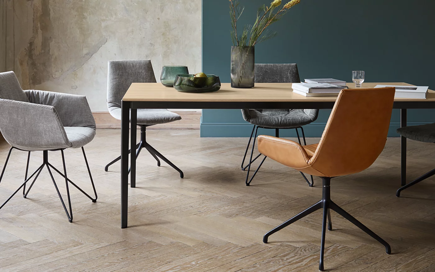 lui chair family in leather or fabric with swivel, wire frame in matt black and tak table in oak white oil wood