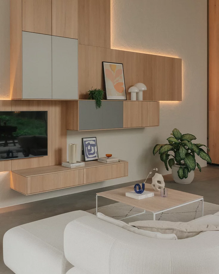 filigno Wohnzimmertisch aus Eiche Weißöl massiv mit weißem Fußgestell kombiniert mit der filigno Wohnwand