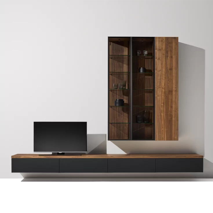 dark wall unit made of real walnut wood combined with black coloured glass and smoked glass in a black aluminium frame
