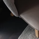 flor upholstered dining chair with leather seat and team7 fabric label, detailed view