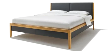 mylon solid wood bed in oak with headboard and bed sides in leather