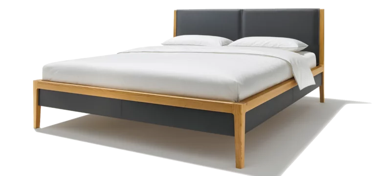 mylon solid wood bed in oak with headboard and bed sides in leather