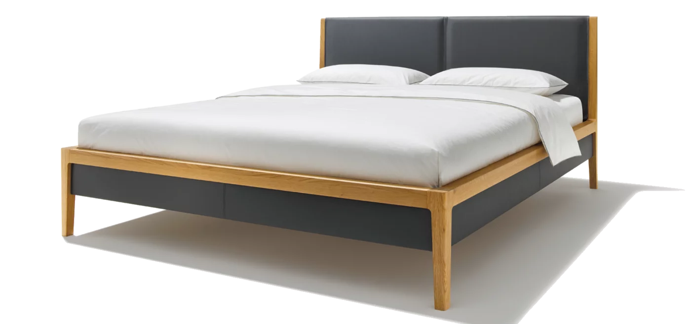 mylon solid wood bed in oak with headboard and bed sides in leather