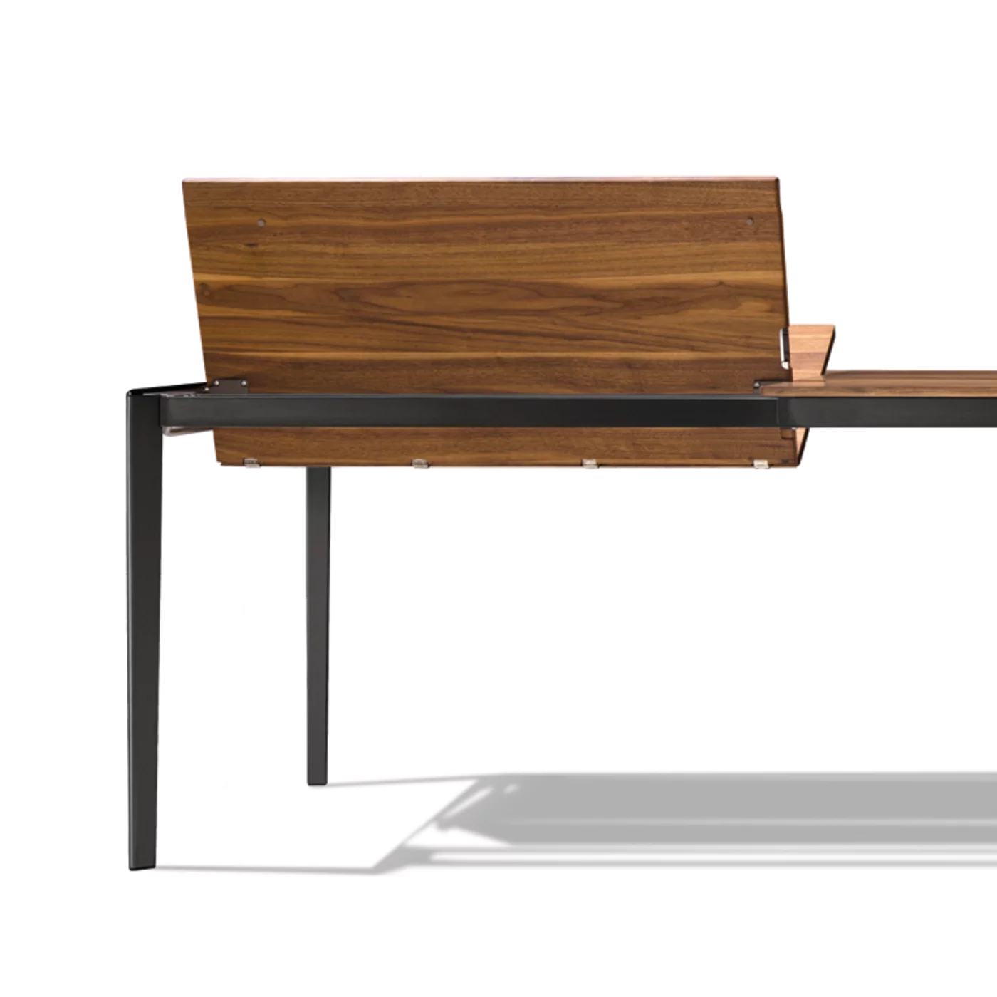 extendable dining table tak made of solid wood in walnut