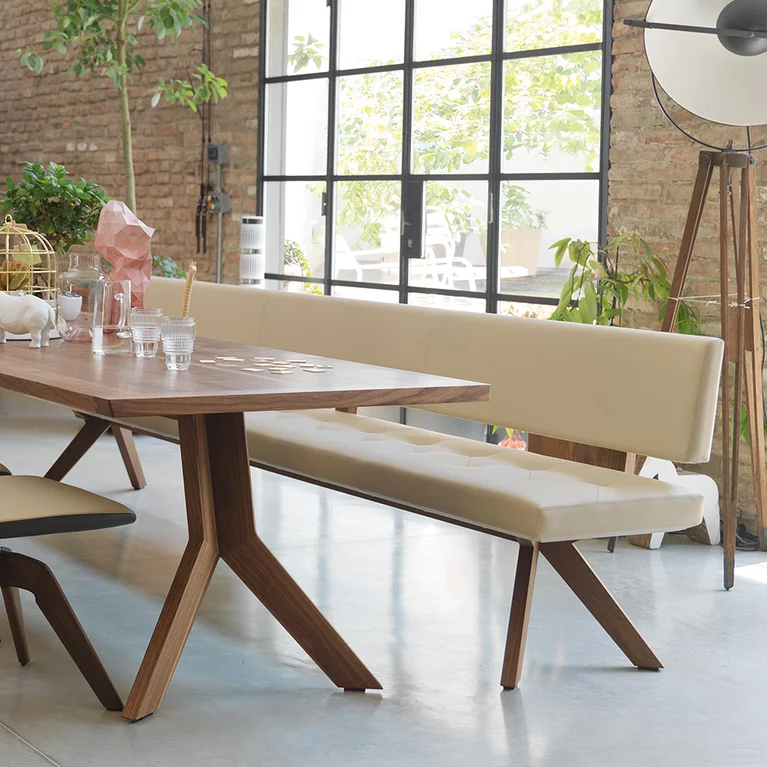 upholstered yps dining bench in leather and elegant yps dining table in walnut wood