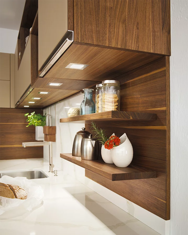 linee kitchen in walnut with coloured glass fronts sand matt and illuminated design element