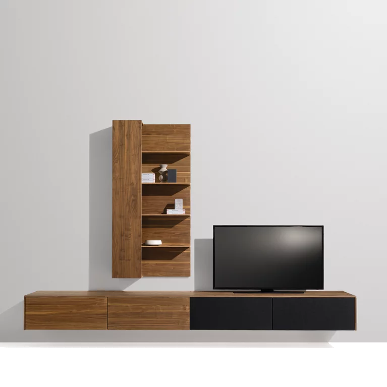 Modern filigno wall unit made of solid walnut with partially concealed storage space