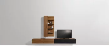 Modern filigno wall unit made of solid walnut with partially concealed storage space