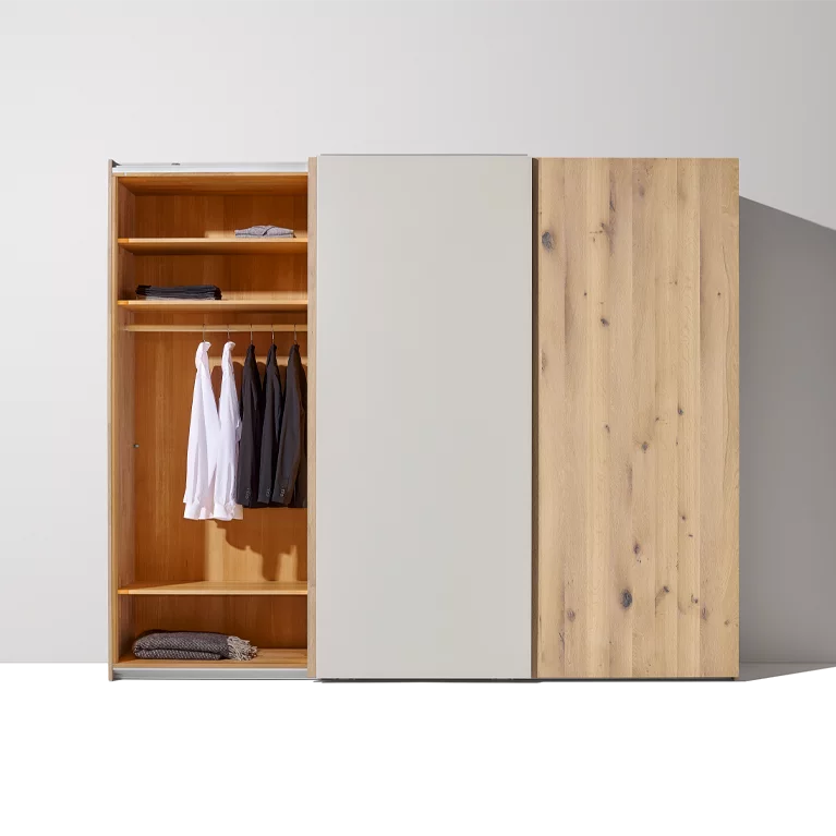 soft sliding door wardrobe in wild oak white oil with coloured glass front open