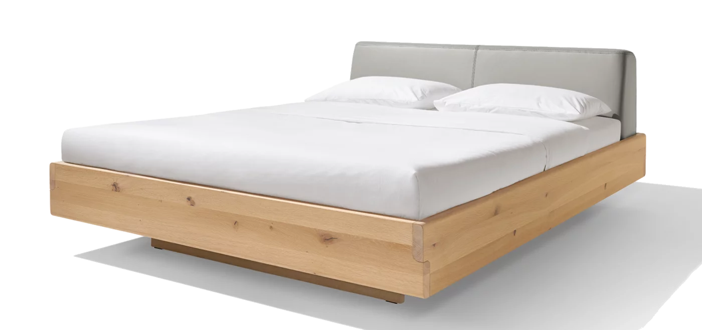 nox natural wood bed in wild oak white oil with leather headboard