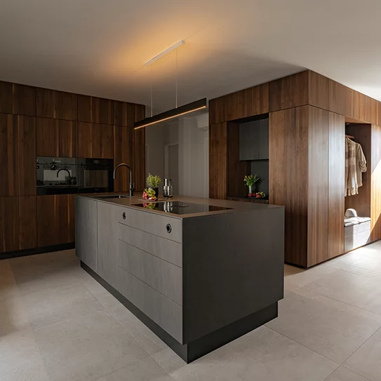 Modern kitchen and hallway combination in solid walnut and ceramic