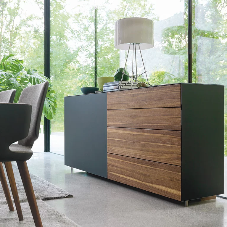 cubus pure sideboard sliding door in walnut and anthracite coloured glass with aye chairs