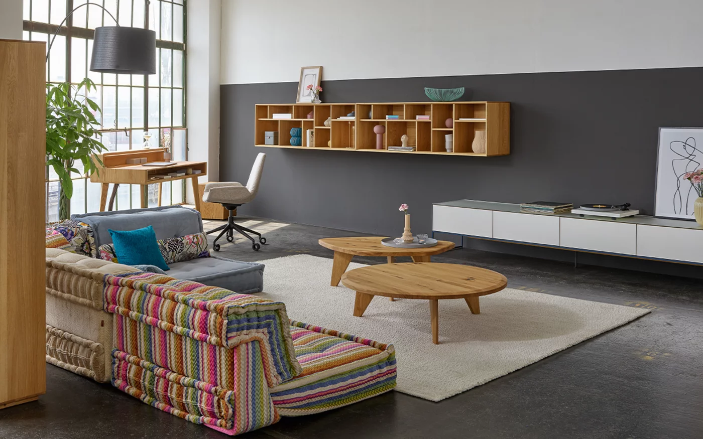 ur coffee tables made of solid wild oak combined with graphic design element and filigno wall unit