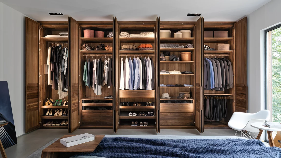 Hinge-door wardrobe made of solid wood with great interior variety valore illuminated hinge-door wardrobe in solid walnut with great interior design variety