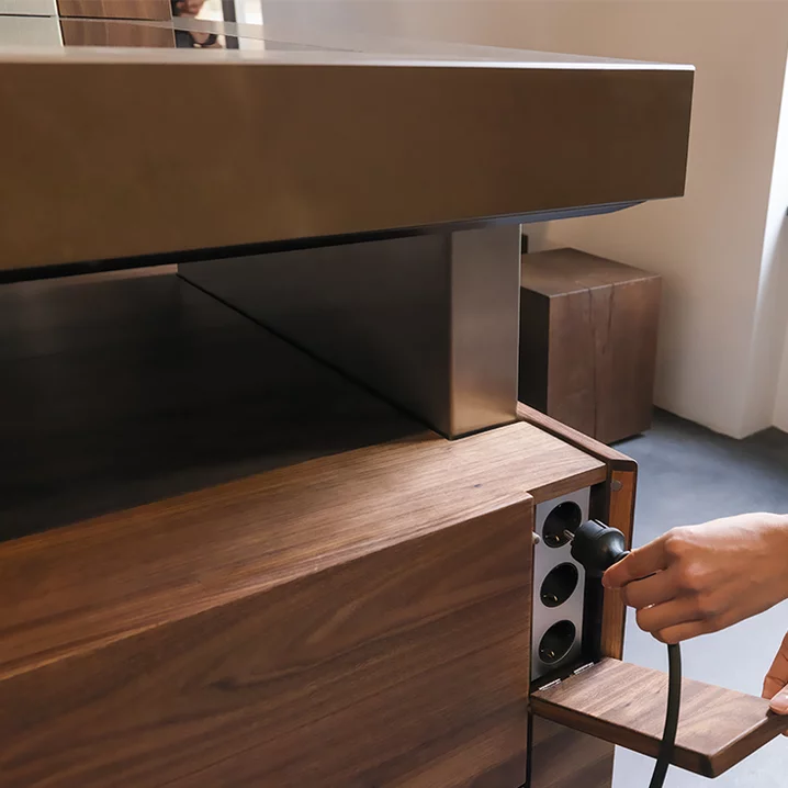 k7 island solid wood kitchen in walnut with concealed sockets in panel, detailed view