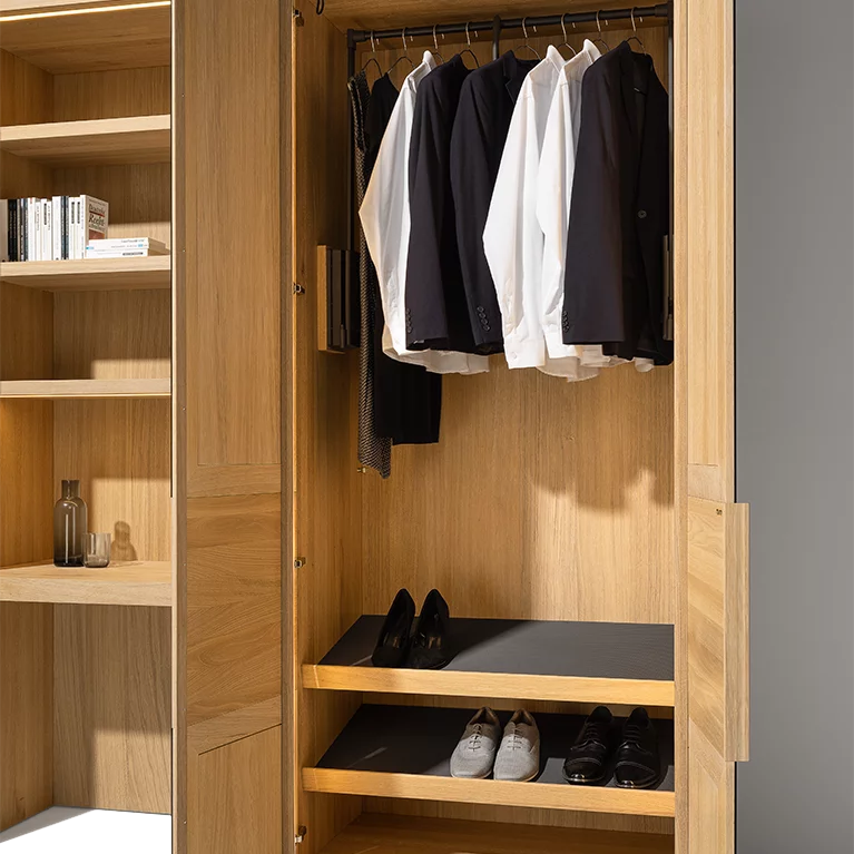 Functional interior with solid wood clothes lift Wardrobe system in oak white oil with functional interior and clothes lift