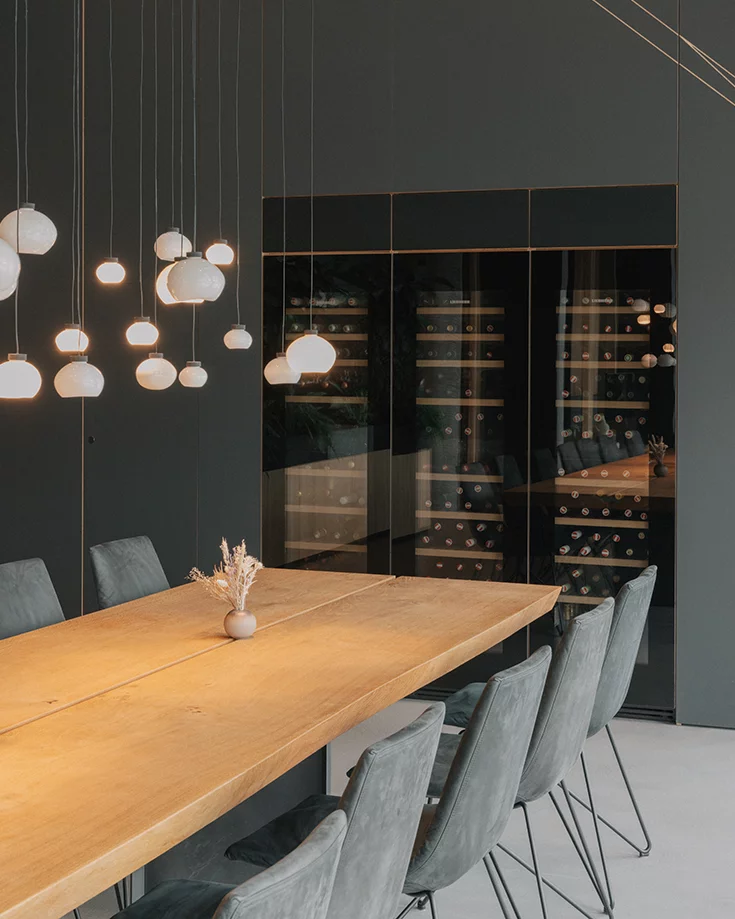 leather swivel chair lui with frame in matt black and tak dining table