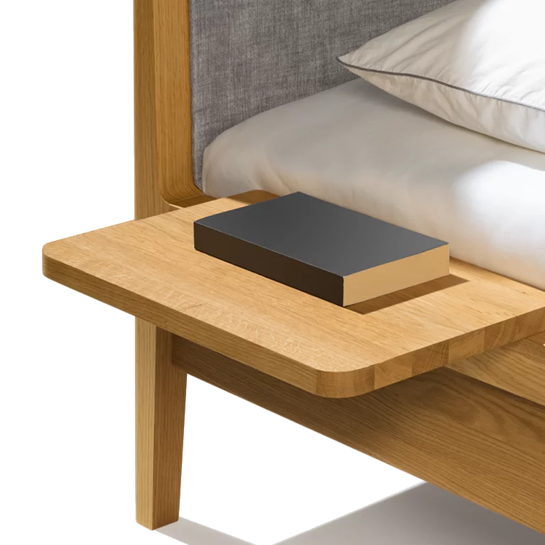 mylon bed with bedside cabinet and upholstered headboard in solid oak, detailed view
