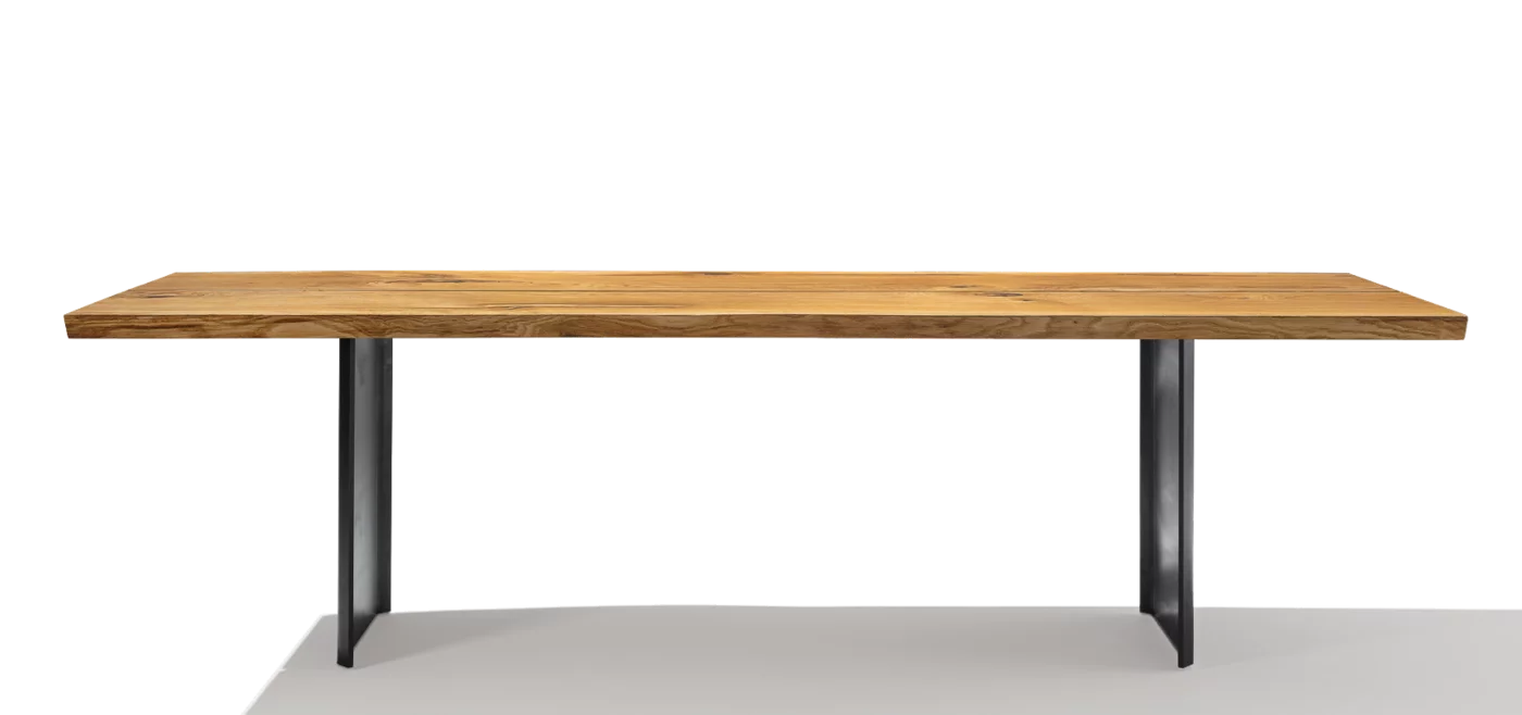 echt.zeit solid wood dining table in rustic brushed oak with burnished steel frame, side view