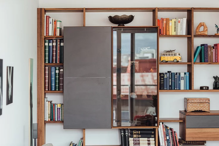 cubus wall unit in walnut, basalt black ceramic front and smoked glass door, detailed picture cubus wall unit with space for books in walnut wood, basalt black ceramic front and smoked glass door, detailed picture