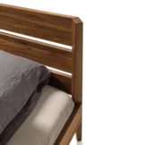 light bed in solid walnut with intelligent plug-in connection
