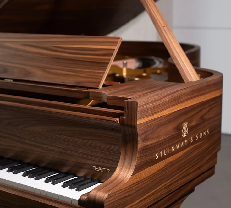 Solid walnut grand piano in co-operation with Steinway & Sons