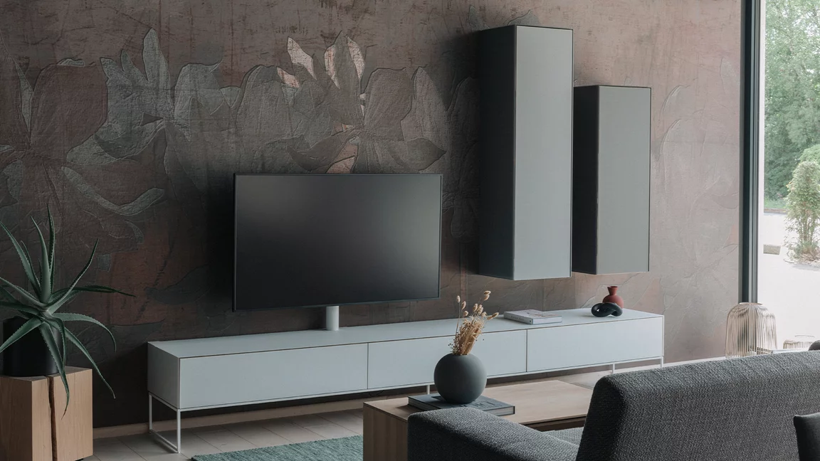 TV furniture cubus pure in white and light grey coloured glass with snow-white metal frame in a modern living room