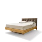 float bed in solid oak with leather headboard