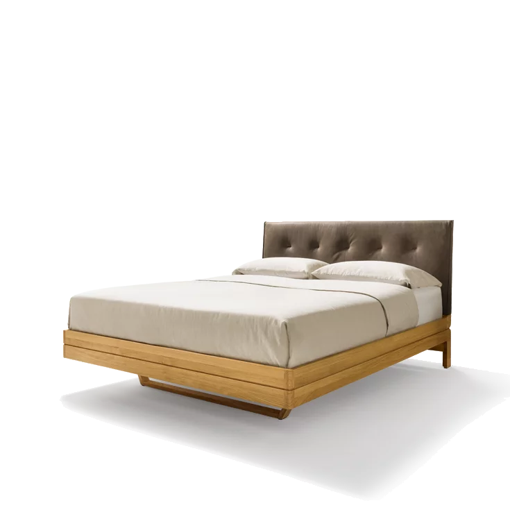 float bed in solid oak with leather headboard