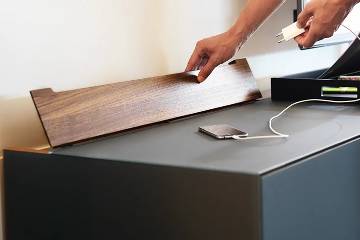 cable outlet from home entertainment in solid walnut, detailed image