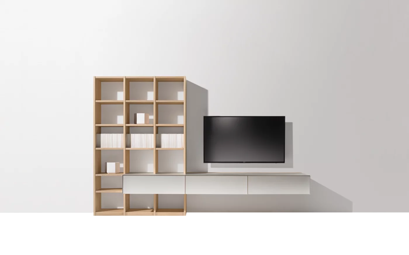modern cubus pure wall unit in white coloured glass with a design element in oak white oil