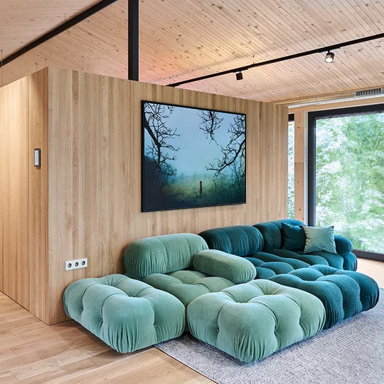 Rear of free-standing customised larder integrated into solid oak kitchen block