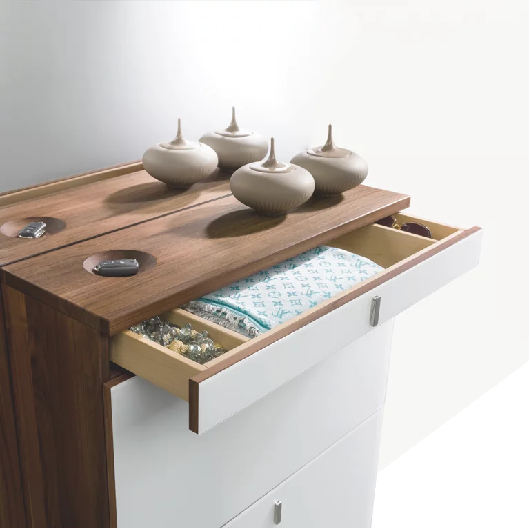 cubus shoe hinged chest of drawers in walnut with coloured glass fronts, hinged handles and key recesses