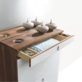 cubus shoe hinged chest of drawers in walnut with coloured glass fronts, hinged handles and key recesses