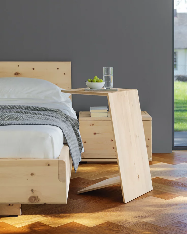 nox bed in solid swiss pine with untreated wooden headboard, the nox bedside cabinet and sidekick side table