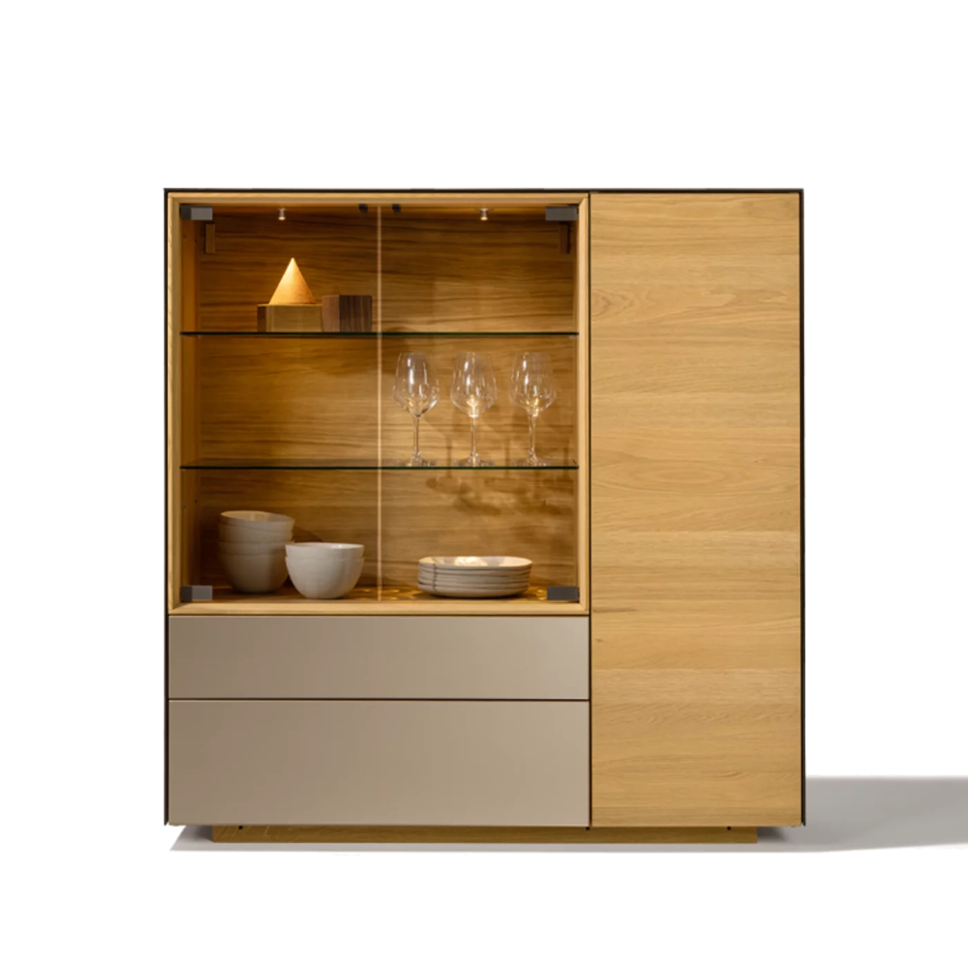 elegant cubus pure highboard in solid oak with coloured glass drawers and lighting behind all glass doors in smoked glass