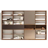 Elegant cubus shelf in solid walnut with hinged doors and sliding doors in wood and bronze coloured glass